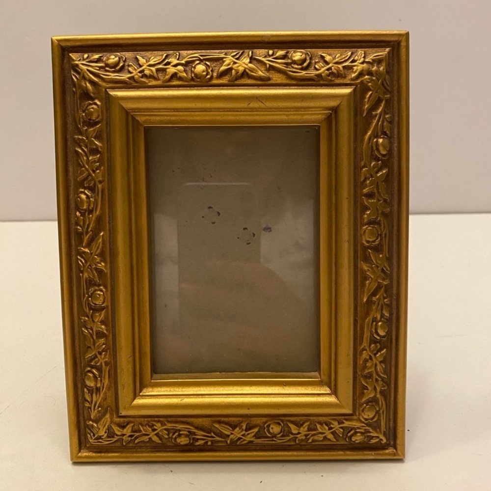 Gold color standing picture frame with flower vines designs